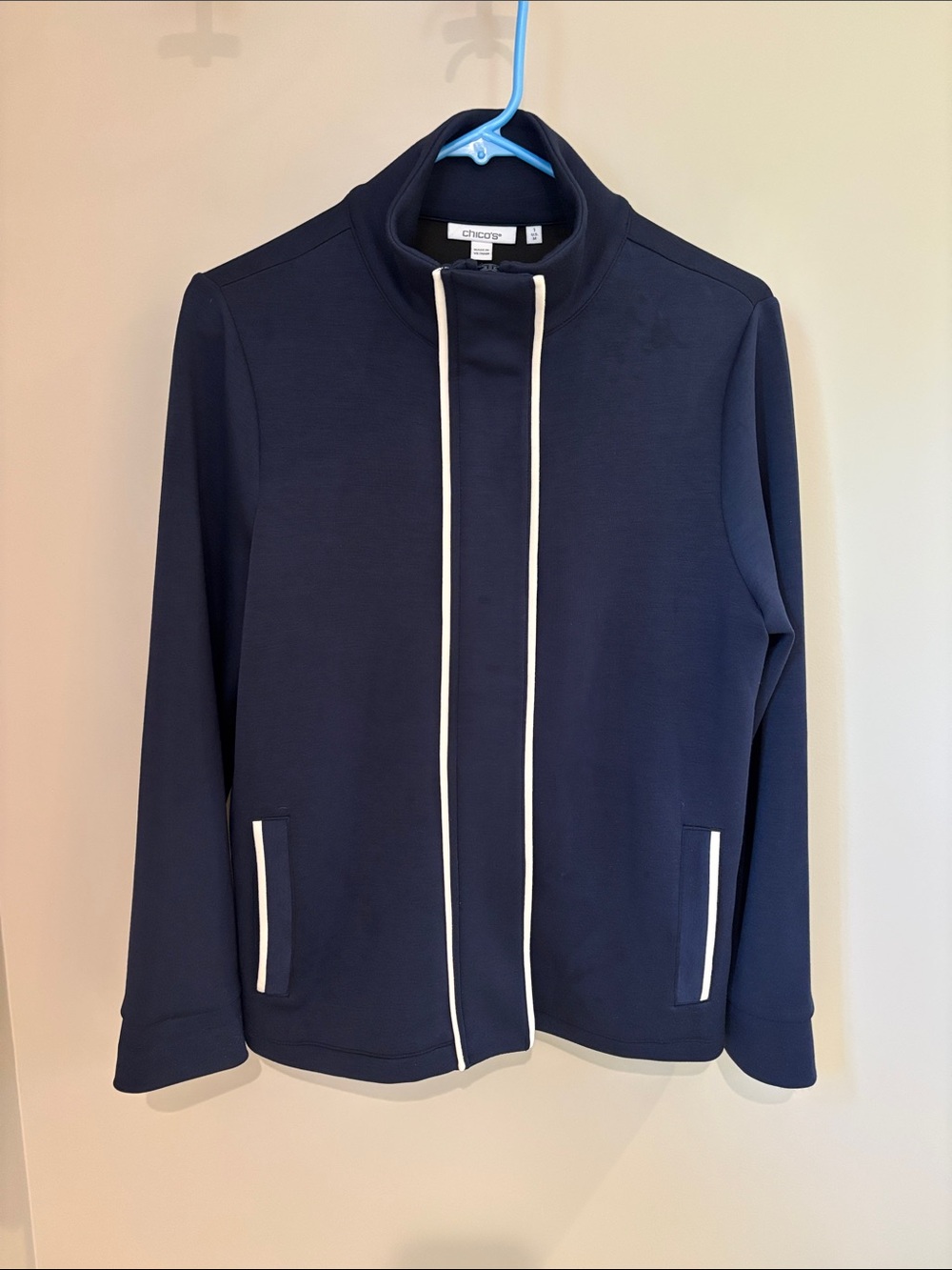 Chico's Zenergy UPF contrast navy blue jacket with white trim; size 1 (US M)